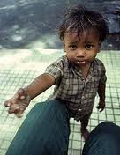 Crippled Child Begging in Bombay