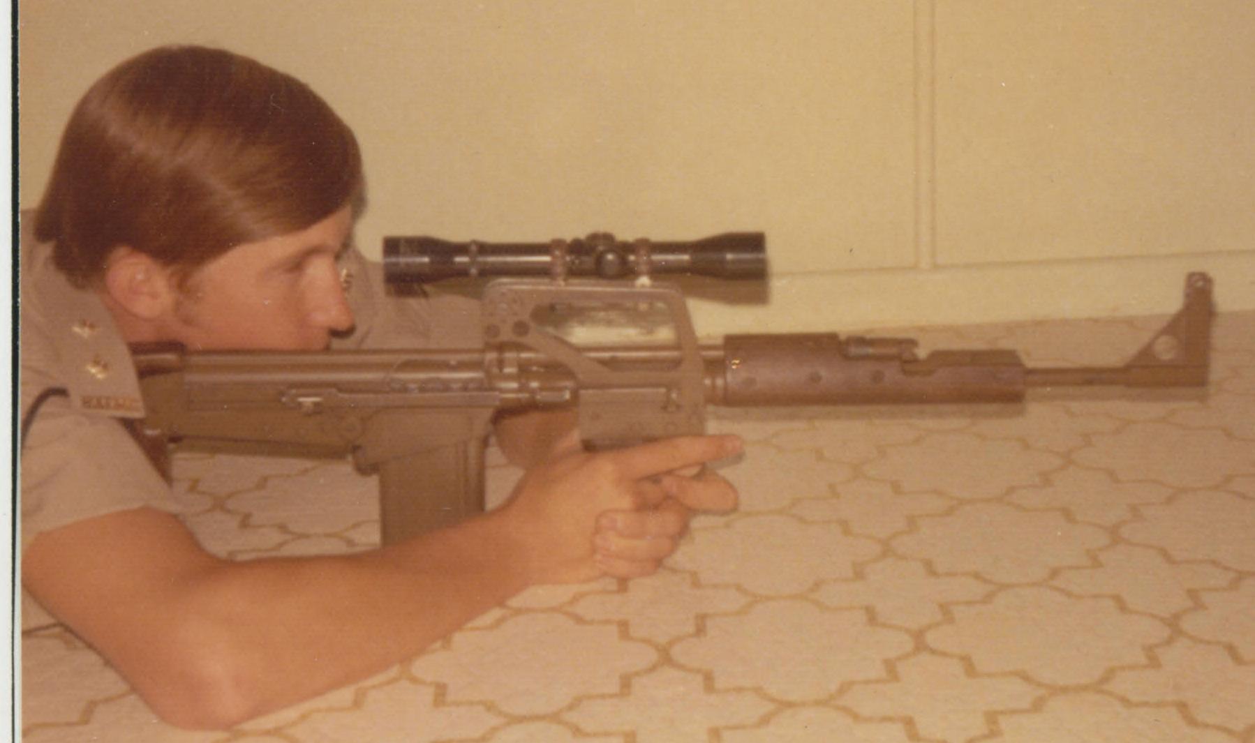 Extremely stable prone position with two hands on pistol grip, with Sniper Scope fitted